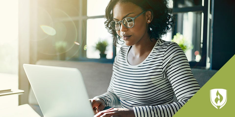 female student in front of laptop