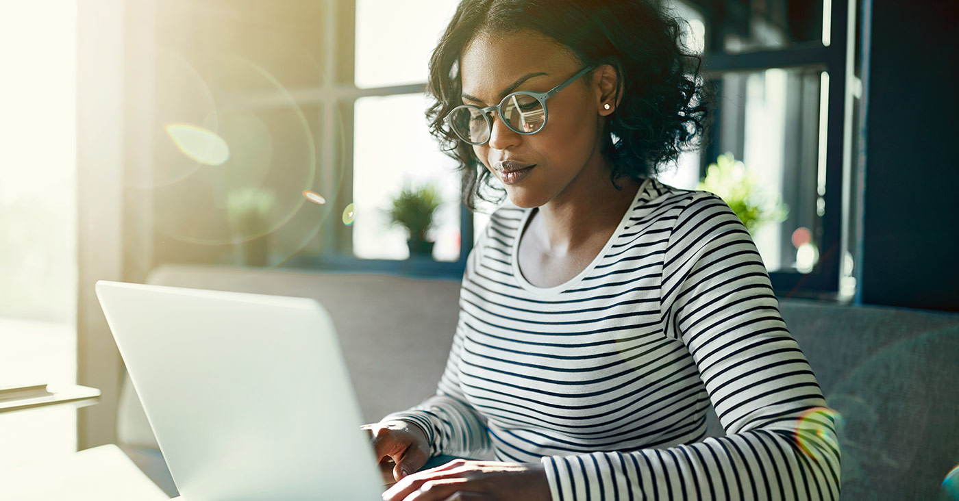 female student in front of laptop