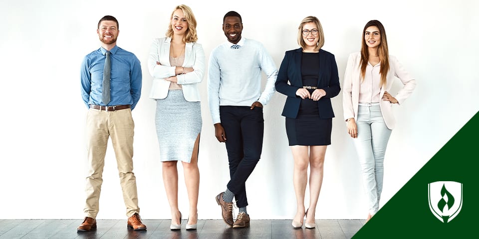 Photo of five business professionals standing in a line.