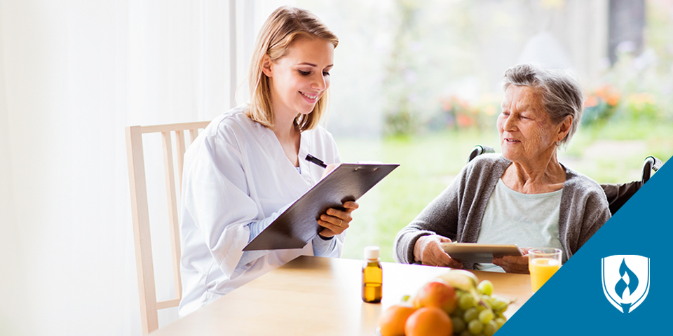 nurse helping older women