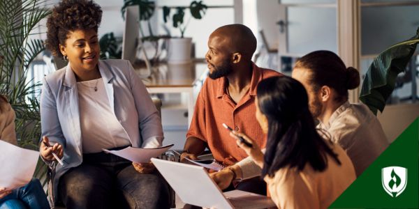 A team leader meets with a small group to discuss