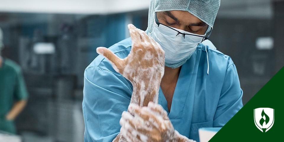 photo of a scrub tech scurbbing into surgery representing surgical tech duties