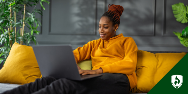 A healthcare professional works from her laptop at home