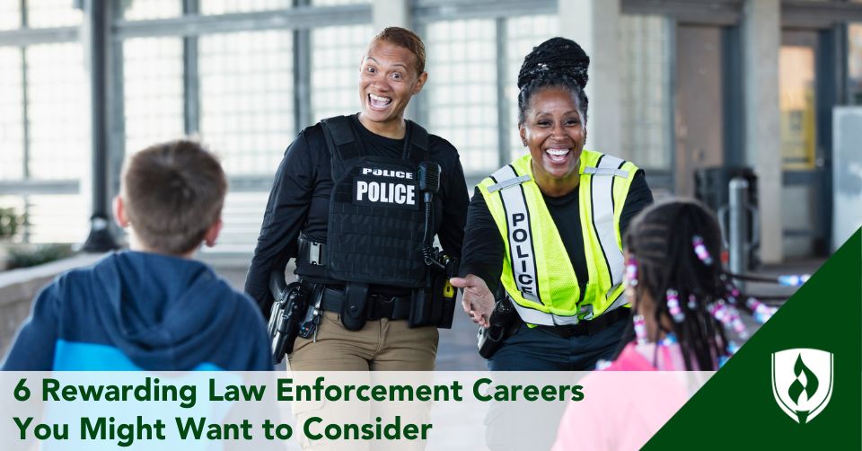 Two police officers in different uniforms greet children