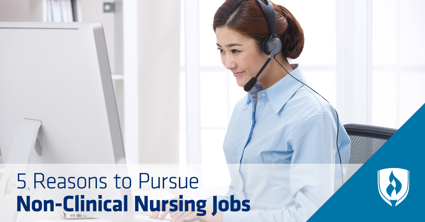 female with phone headset sitting in front of computer