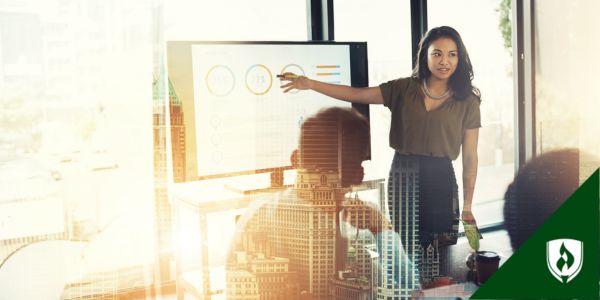 A data analyst presents her findings in a meeting