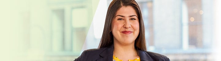 young female business professional smiling at camera 1