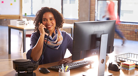 female business manager talking on the phone