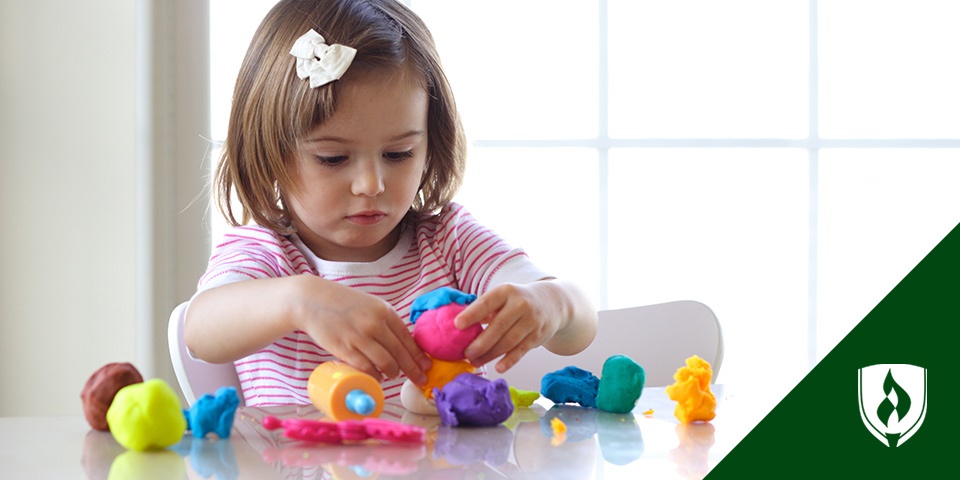 childs hands finger painting